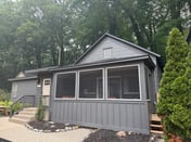 Screened porch pt water views hot tub walk to Saug